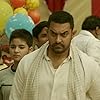Aamir Khan, Zaira Wasim, and Suhani Bhatnagar in Dangal (2016)