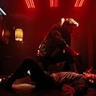 Mike Moh and Liam Hemsworth in Killerman (2019)