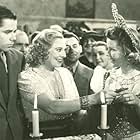 Glenn Ford, Marjorie Rambeau, and Jean Rogers in Heaven with a Barbed Wire Fence (1939)