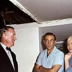 Sean Connery, Ian Fleming, and Shirley Eaton in Goldfinger (1964)