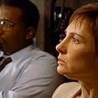 Laurie Metcalf and Wendell Pierce in Bulworth (1998)