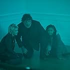 Russell Crowe, Chloe Bailey, and Ryan Simpkins in The Exorcism (2024)