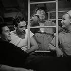 John Garfield, Dane Clark, Tom Tully, and Peter Whitney in Destination Tokyo (1943)