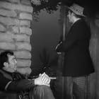 Walter Huston and Thomas Mitchell in The Outlaw (1943)