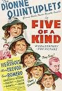 Cesar Romero, Annette Dionne, Cecile Dionne, Emilie Dionne, Marie Dionne, Yvonne Dionne, Jean Hersholt, and The Dionne Quintuplets in Five of a Kind (1938)