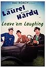 Oliver Hardy, Edgar Kennedy, and Stan Laurel in Leave 'em Laughing (1928)