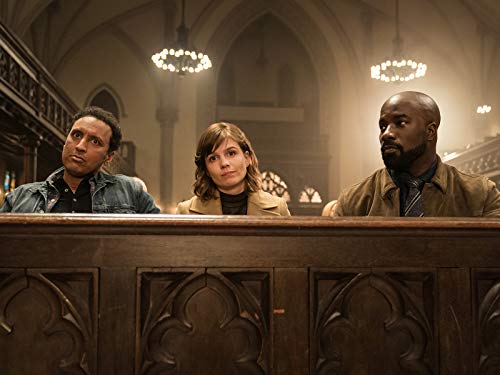 Aasif Mandvi, Katja Herbers, and Mike Colter in Book 27 (2020)