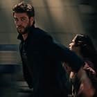 Liam Hemsworth and Diane Guerrero in Killerman (2019)