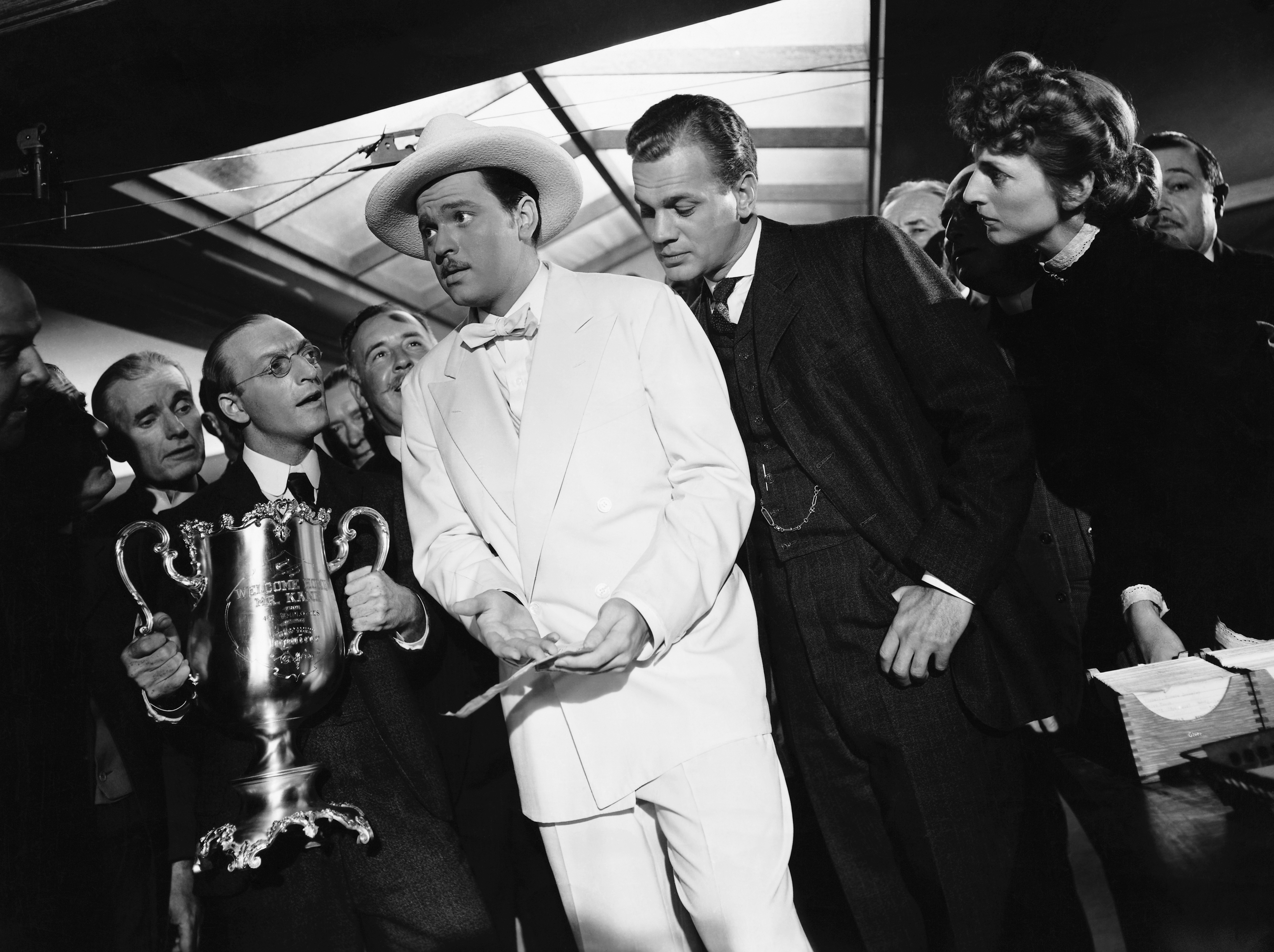 Orson Welles, Joseph Cotten, Ellen Lowe, and Everett Sloane in Citizen Kane (1941)