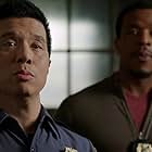 Russell Hornsby and Reggie Lee in Grimm (2011)