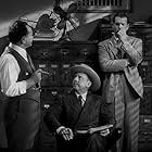 Edward G. Robinson, Porter Hall, and Fred MacMurray in Double Indemnity (1944)