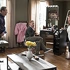 Jesse Tyler Ferguson, Eric Stonestreet, and Dana Powell in Modern Family (2009)