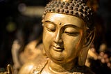 Close-up of a golden Buddha statue.