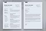 A portrait of a resume template filled in with placeholder info sitting on a clean gray surface.