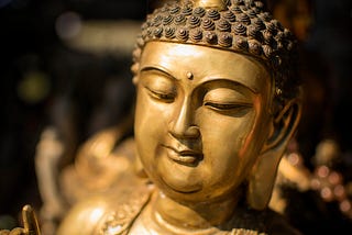 Close-up of a golden Buddha statue.