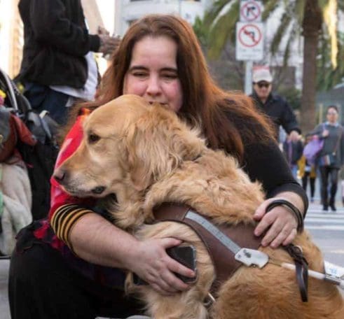 visually impaired woman with service dog