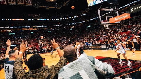 Fans sitting courtside at Kaseya Center during a game between the Miami Heat and Detroit Pistons in Miami, FL on March 5, 2024.