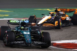 Aston Martin's Fernando Alonso is followed by McLaren's Oscar Piastri during Formula 1's 2024 Bahrain Grand Prix.