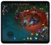 League of Legends: Wild Rift is being played on an Android foldable phone.