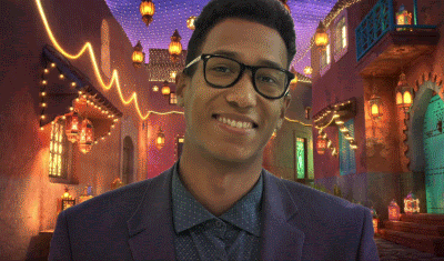 An animated gif of a man looking at the screen and talking, indicating he’s in a video meeting. Behind him is a superimposed background of a lantern-filled street.