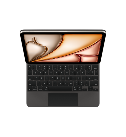 Un iPad Air agganciato a una Magic Keyboard nera, tasti neri con simboli bianchi, tasti freccia disposti a T capovolta, trackpad integrato