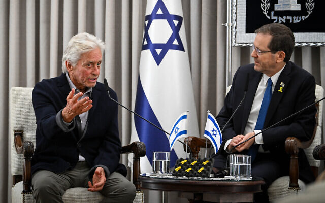 American actor Michael Douglas is hosted by President Isaac Herzog at the President residence in Jerusalem, June 2, 2024. (Arie Leib Abrams/Flash90)