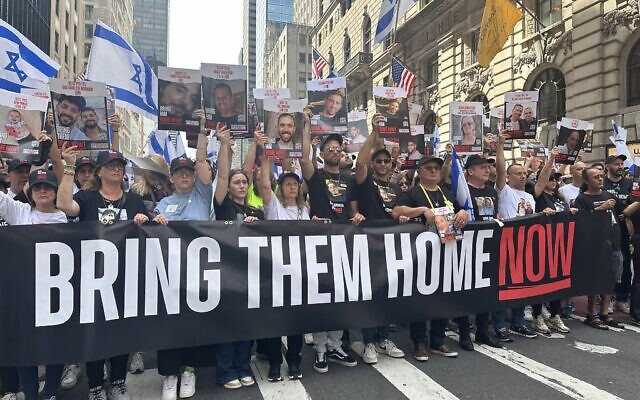Participants march during the annual Israel Day Parade on Fifth Avenue on Sunday, June 2, 2024, in New York. (Jordana Horn)